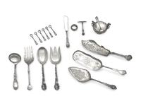 An Assembled Group of Eighteen Sterling Silver and Silver Serving Pieces, Various Makers, Late 19th / Early 20th Century