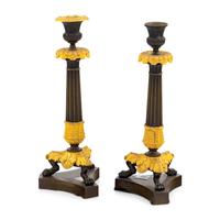 A Pair of Charles X Gilt and Patinated Bronze Candlesticks