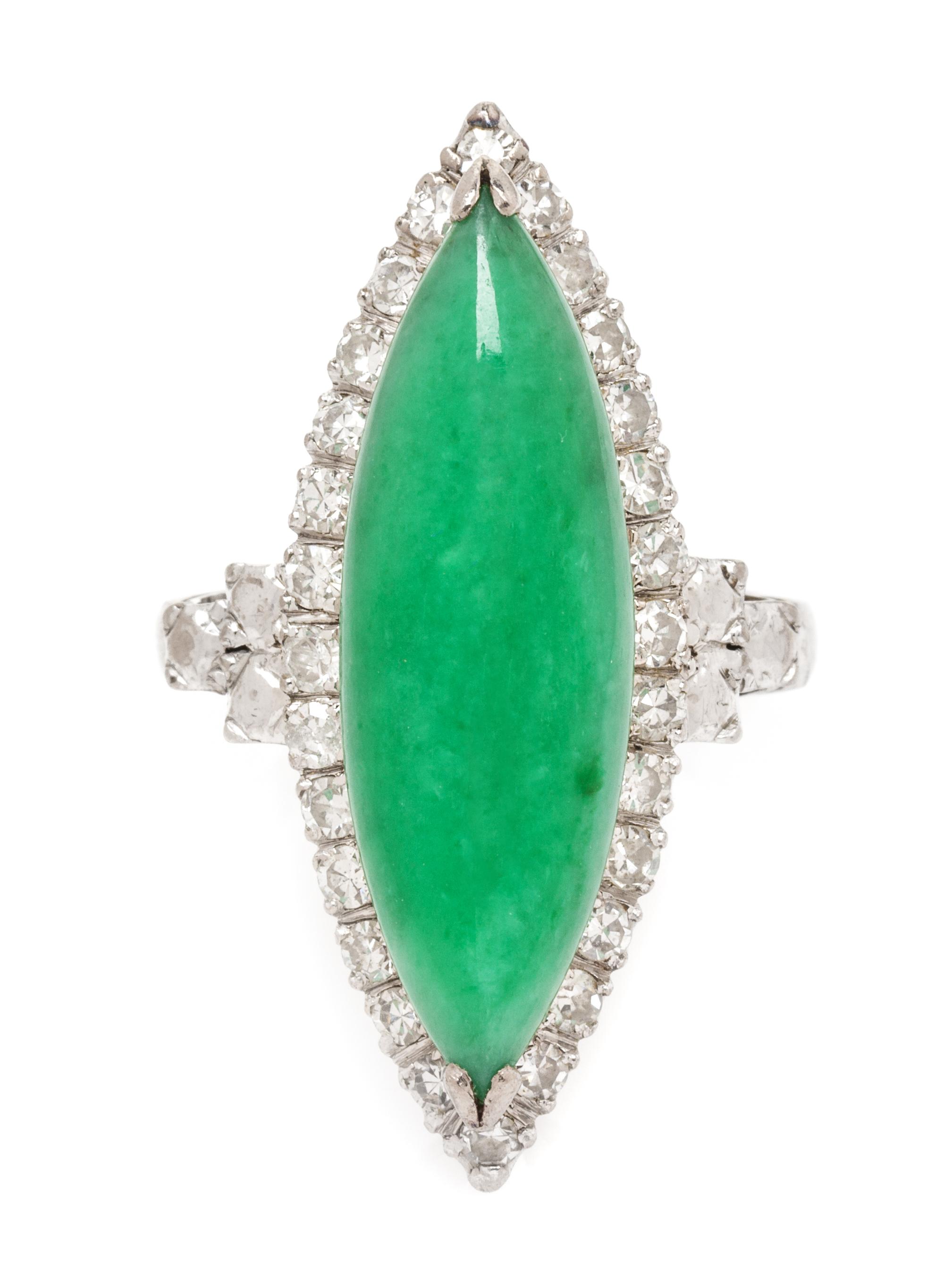 An 18 Karat White Gold, Jade and Diamond Ring, 4.20 dwts.