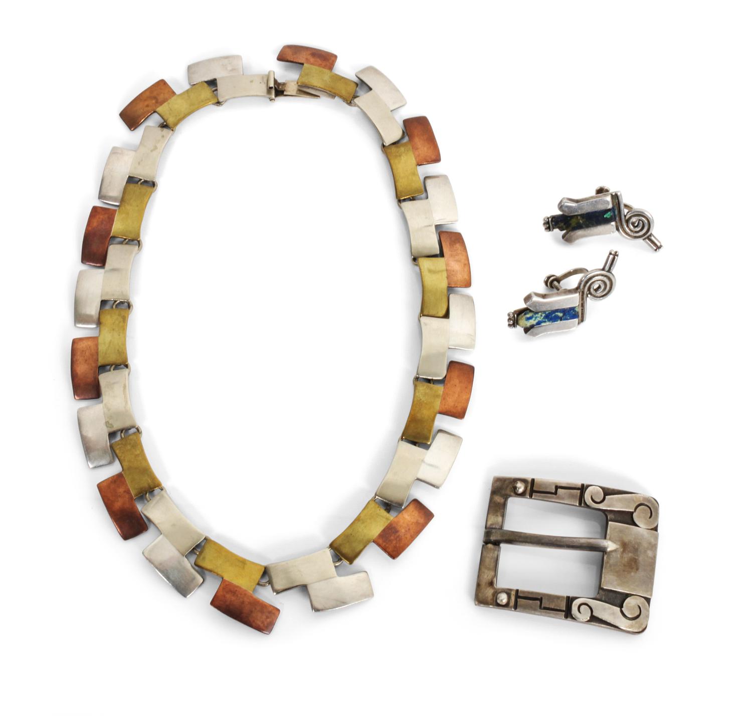 A Mexican Silver Belt Buckle Height of buckle 2 x width 1 1/2 inches.