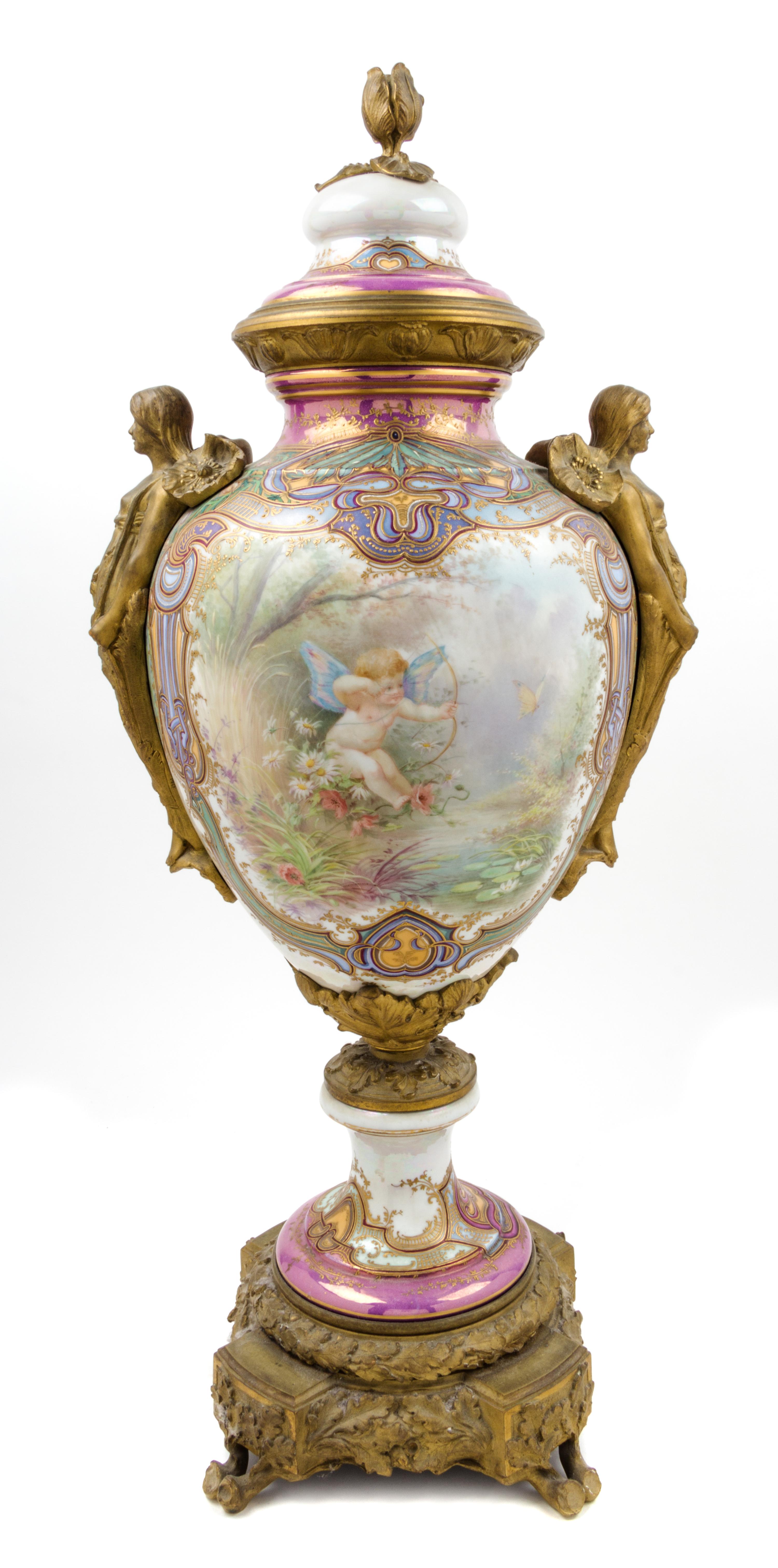 A Sevres Gilt Bronze Mounted Porcelain Urn Height 31 1/2 inches.