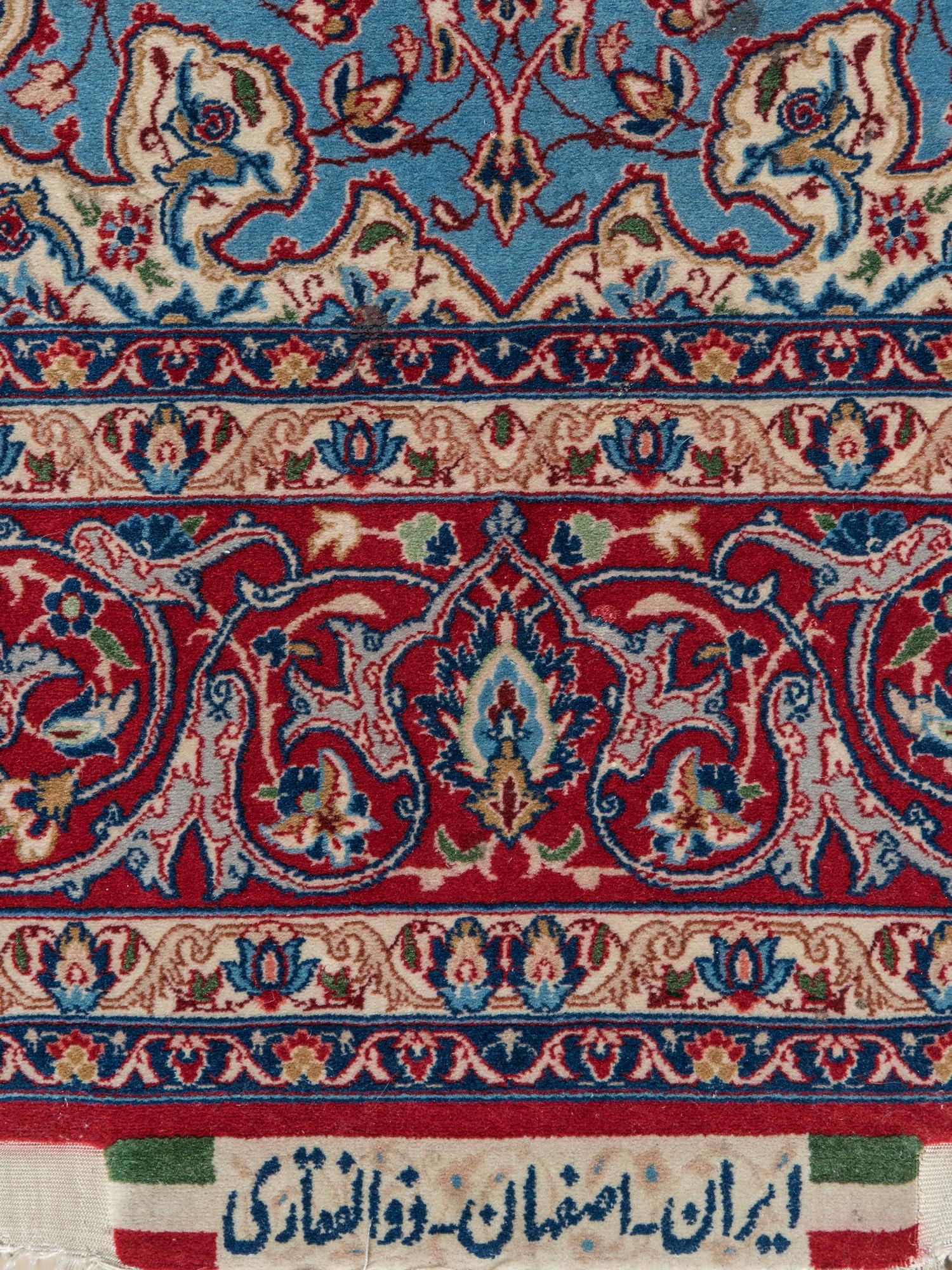 A Signed Isfahan Wool Rug