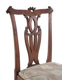 A Set of Seven George III Walnut Dining Chairs