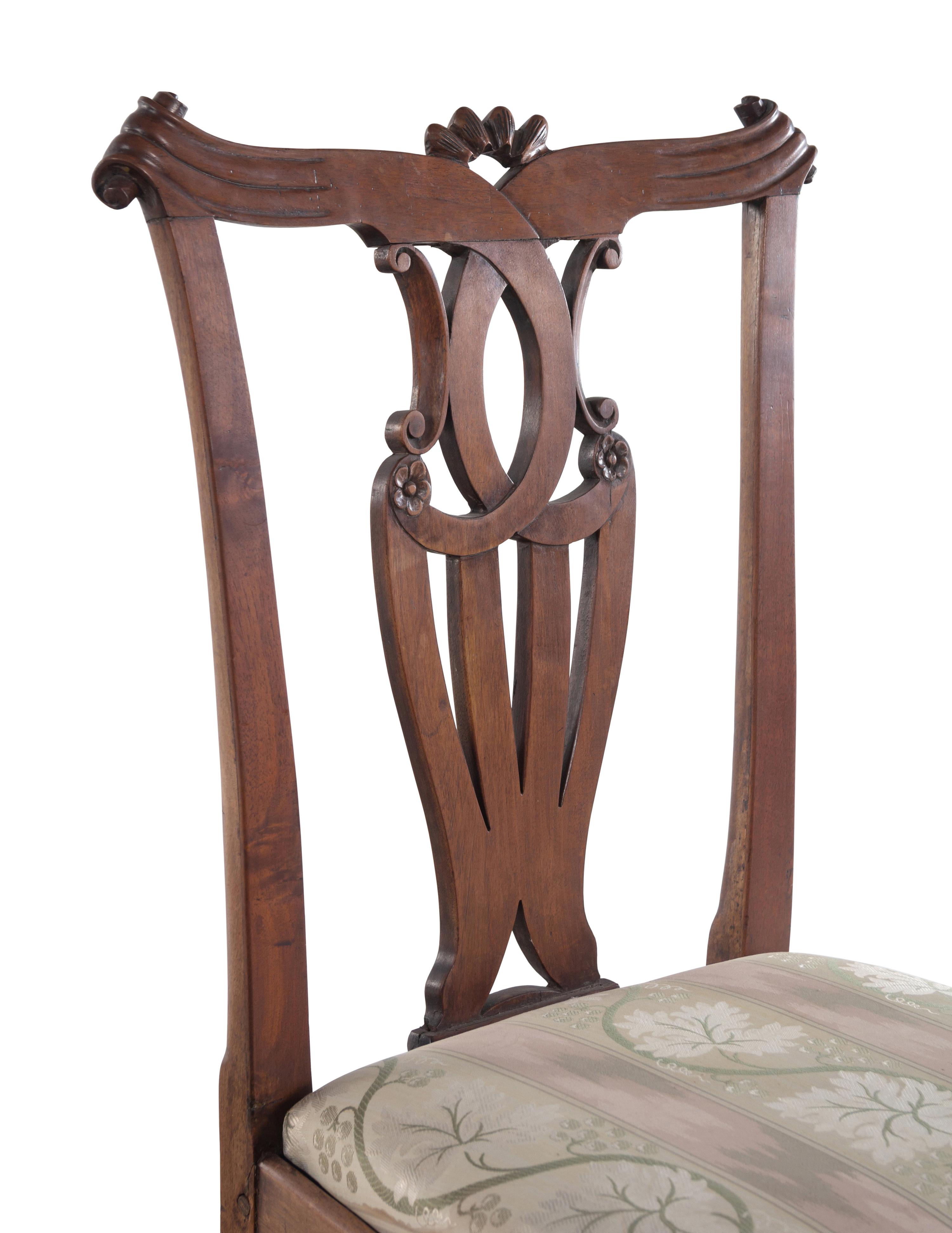 A Set of Seven George III Walnut Dining Chairs