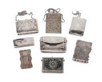 A Collection of Eight Silver Card Cases, Late 19th/Early 20th Century, comprising two unmarked filigree examples, a Niello decorated ex