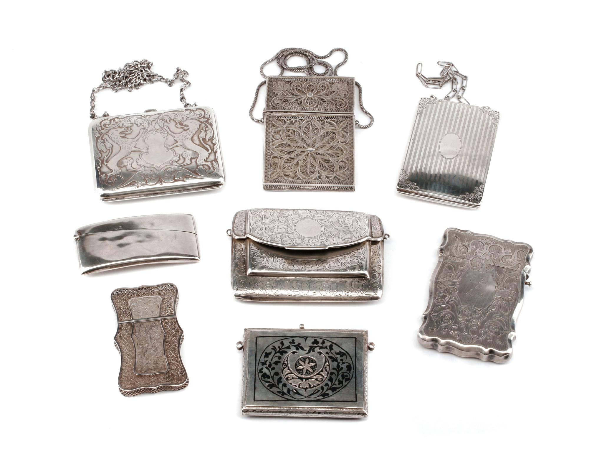 A Collection of Eight Silver Card Cases, Late 19th/Early 20th Century, comprising two unmarked filigree examples, a Niello decorated ex