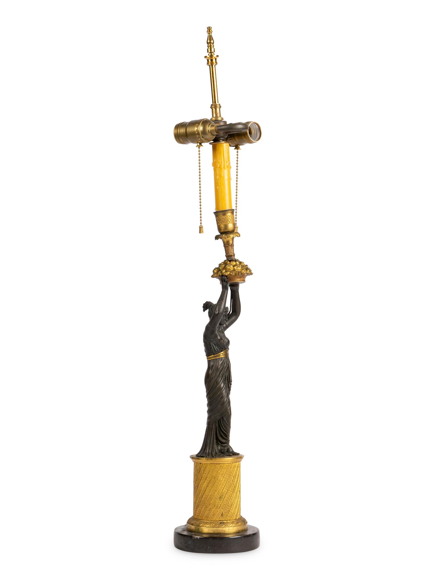 A French Gilt and Patinated Bronze Figure Mounted as a Lamp