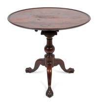 A Chippendale Mahogany Tilt-Top Table