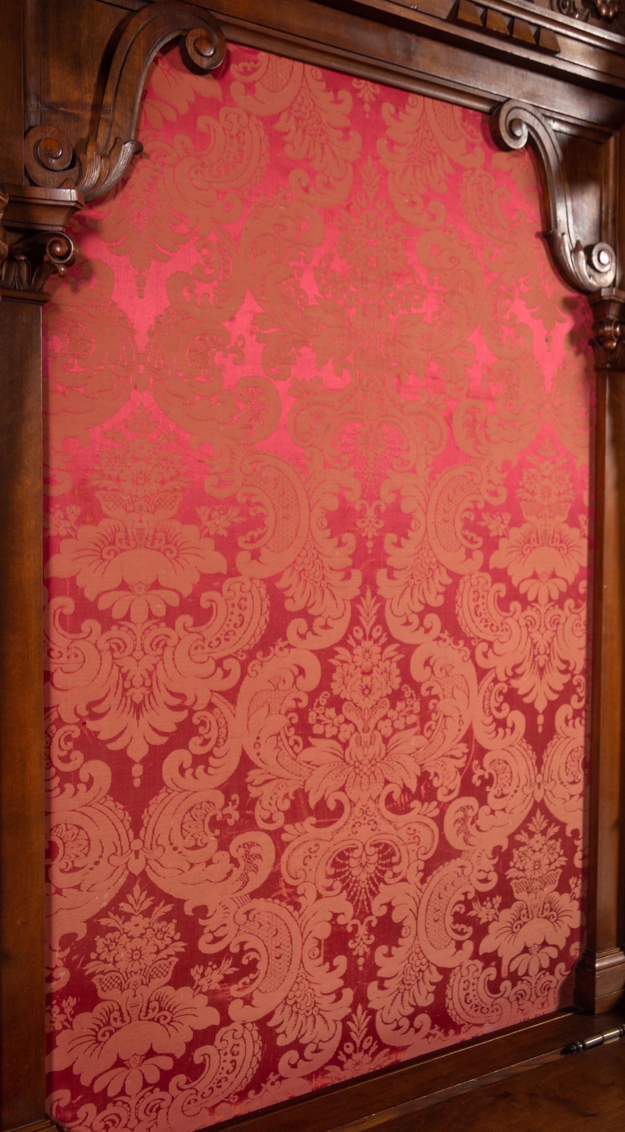 A Renaissance Revival Style Carved Walnut and Marquetry Hall Bench