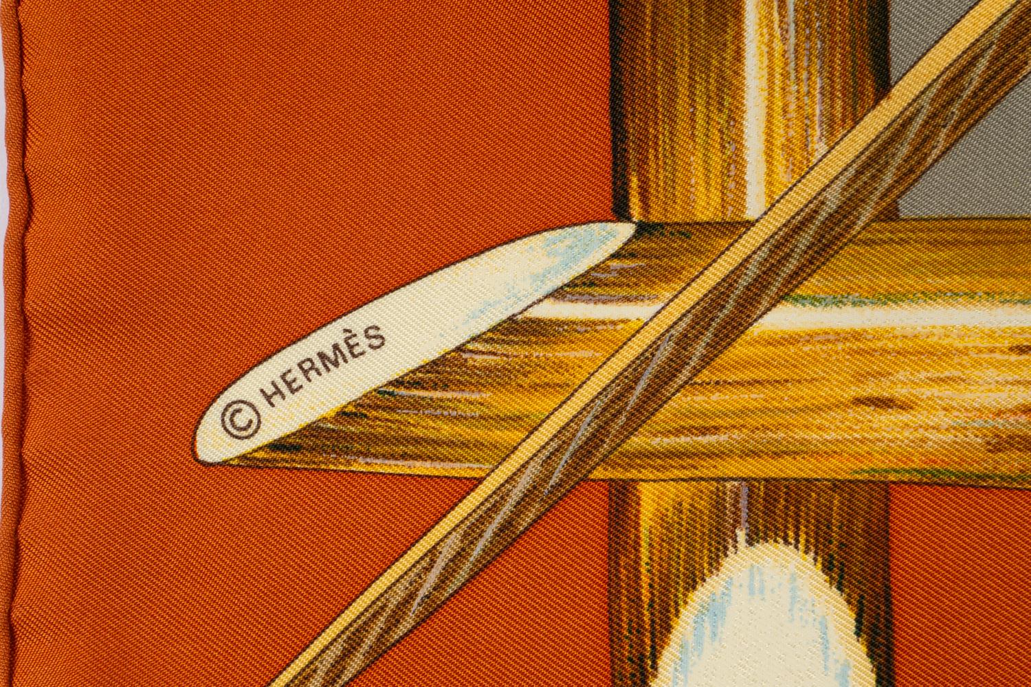Three Hermès Scarves and One Cartier Scarf