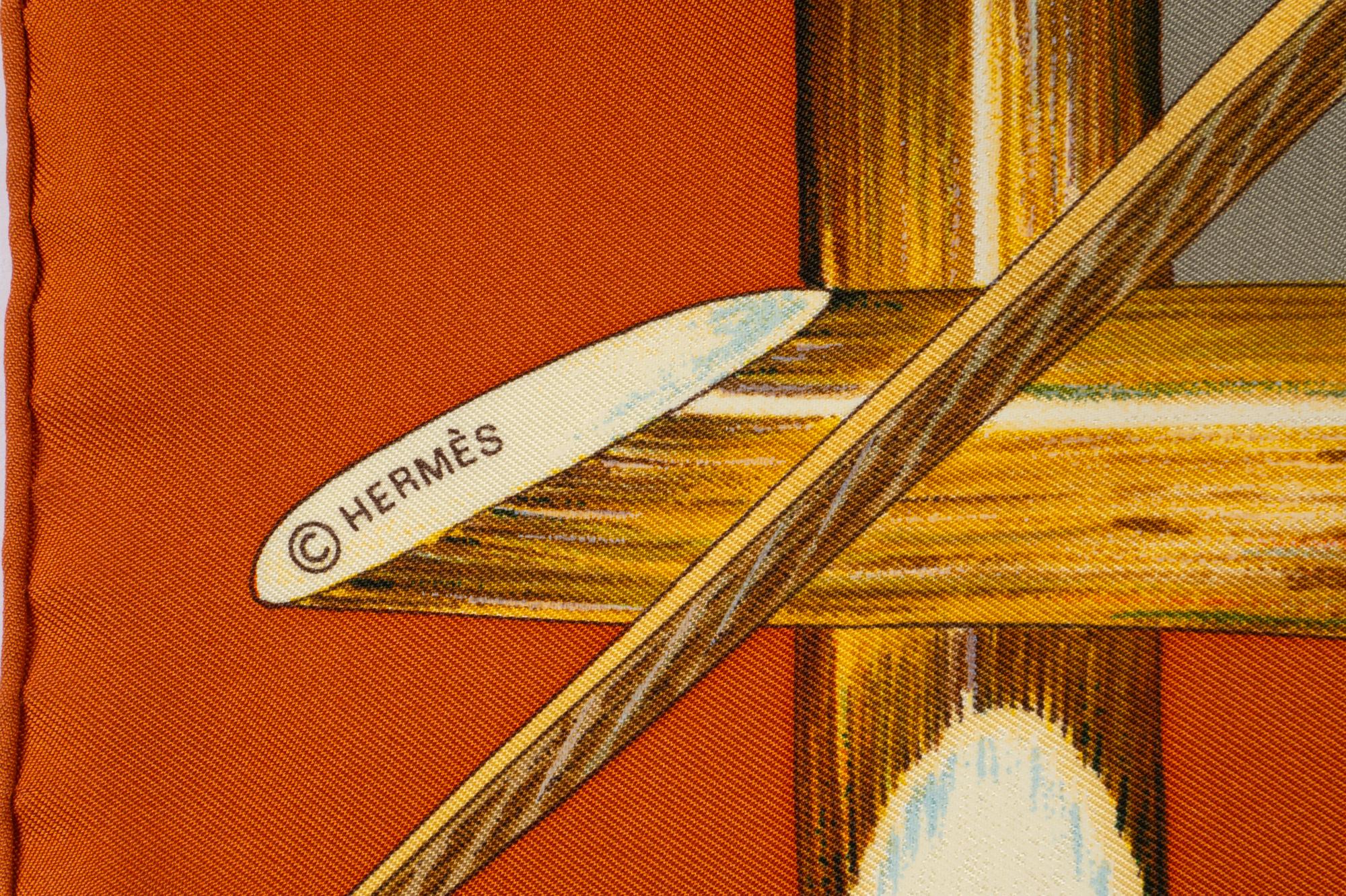 Three Hermès Scarves and One Cartier Scarf