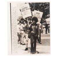 [DAVIS, Angela (b. 1944)]. Press photograph of Davis leading march for the Soledad Brothers in front of the State building in Los Angeles, while regents at UCLA voted against renewing her contract. Los Angeles, CA, 20 June 1970.