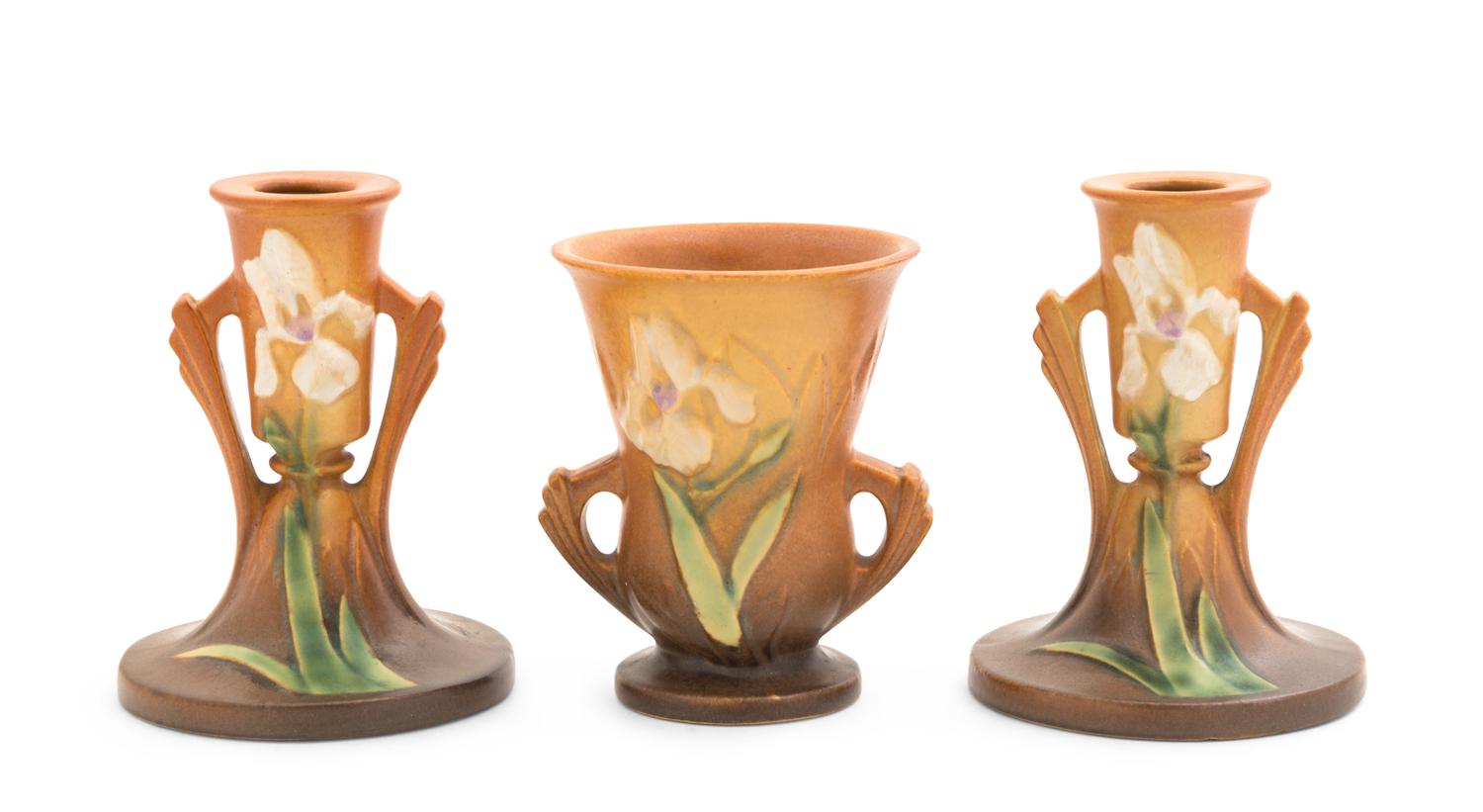 Three Roseville Iris Pottery Articles Height of pair 4 3/4 inches, vase 4 1/4 inches.