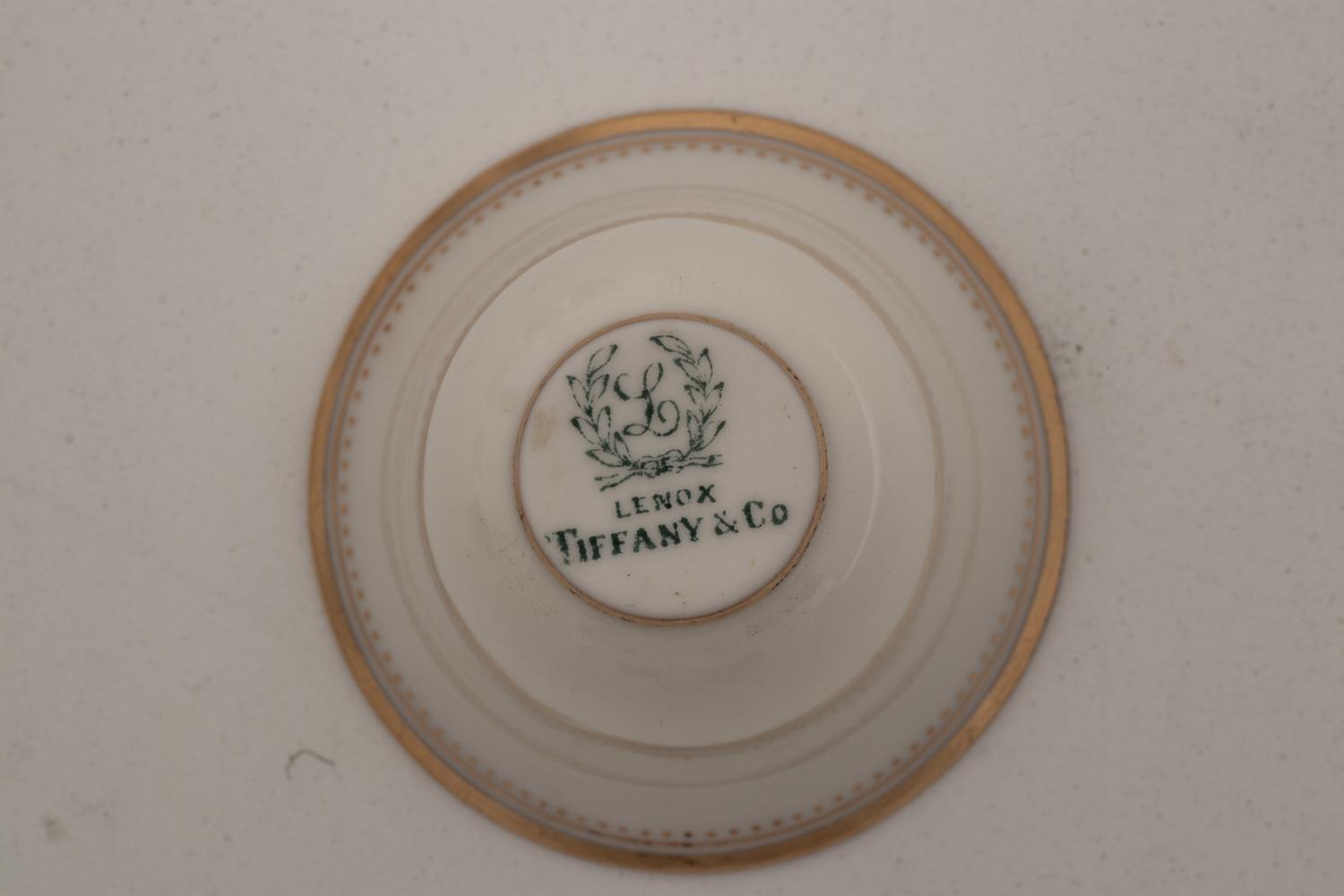 A Set of Twelve Tiffany and Co. Silver Coffee Cups and Saucers
