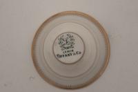 A Set of Twelve Tiffany and Co. Silver Coffee Cups and Saucers