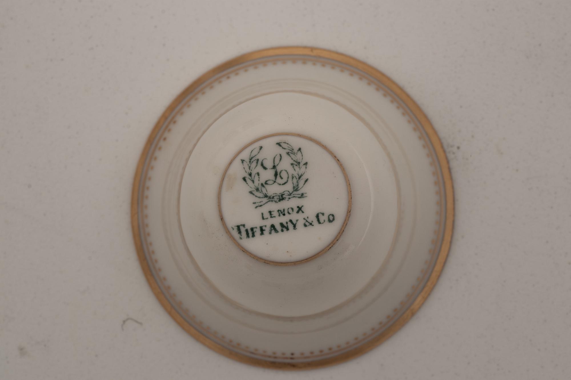 A Set of Twelve Tiffany and Co. Silver Coffee Cups and Saucers