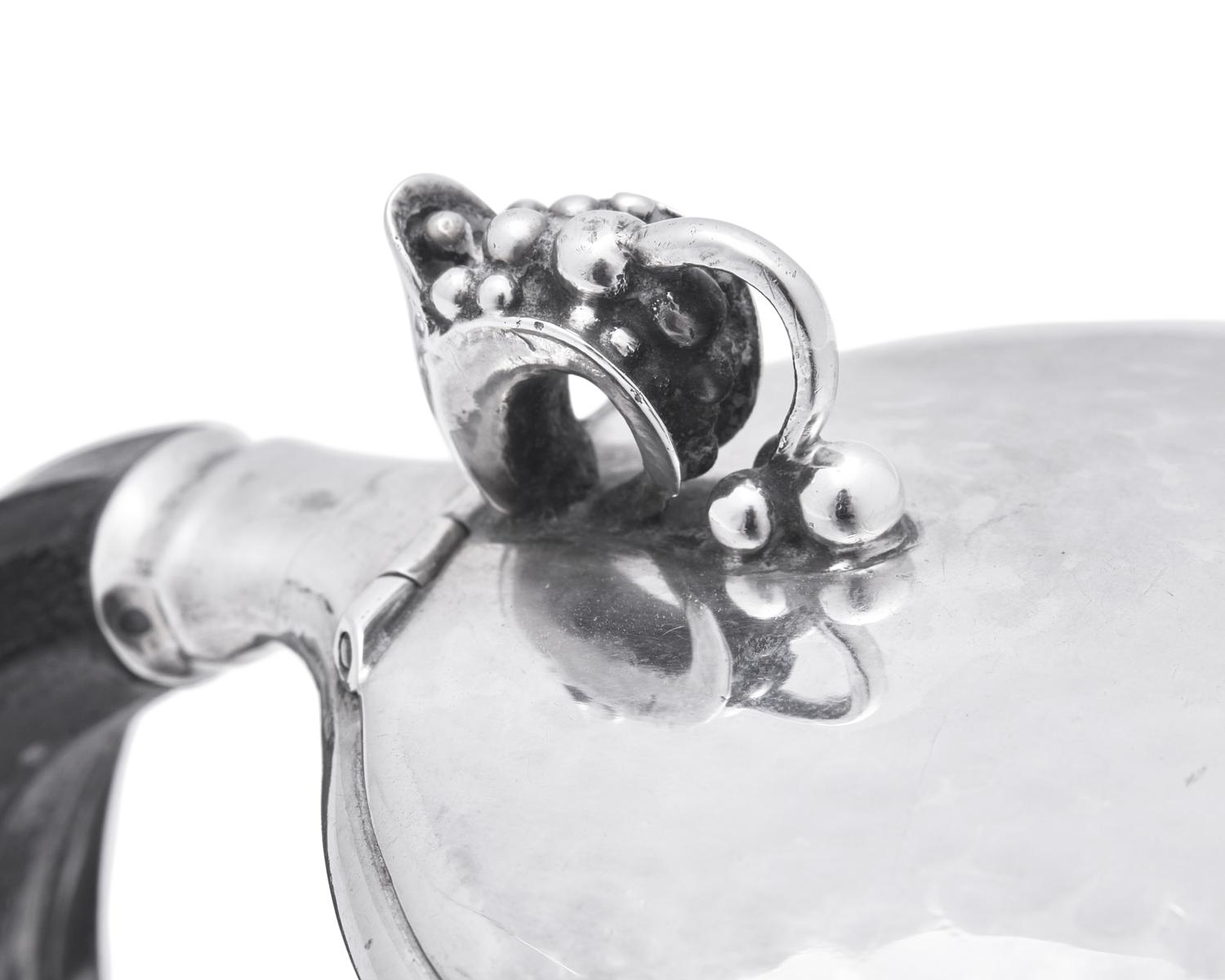 A Georg Jensen Silver Syrup Jug