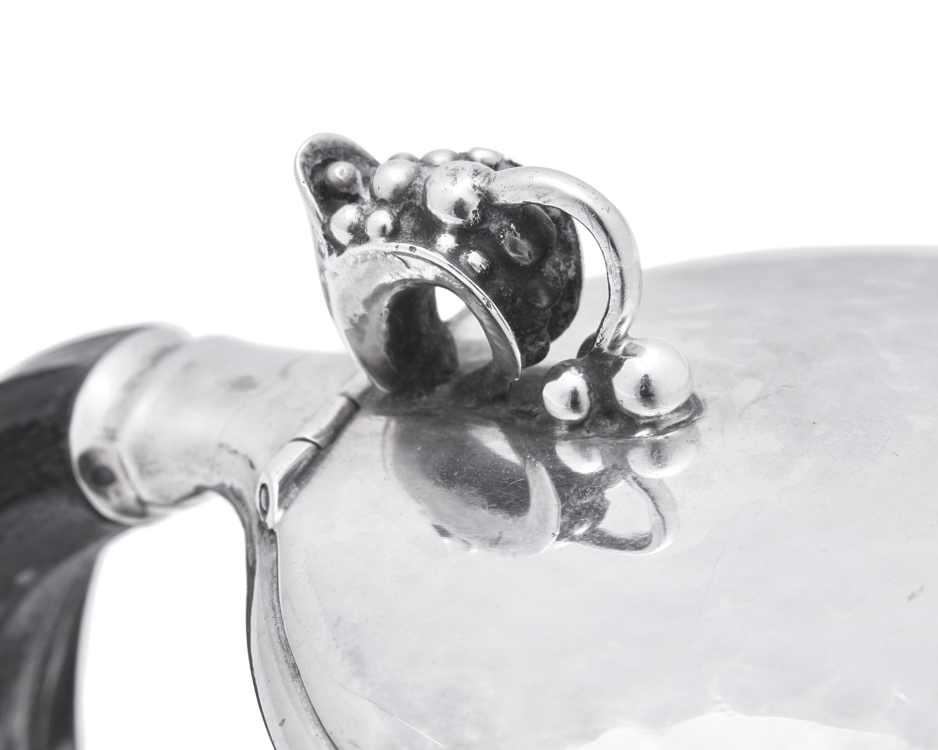 A Georg Jensen Silver Syrup Jug
