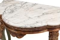 A Pair of Italian Green Painted and Parcel Gilt Marble-Top Console Tables