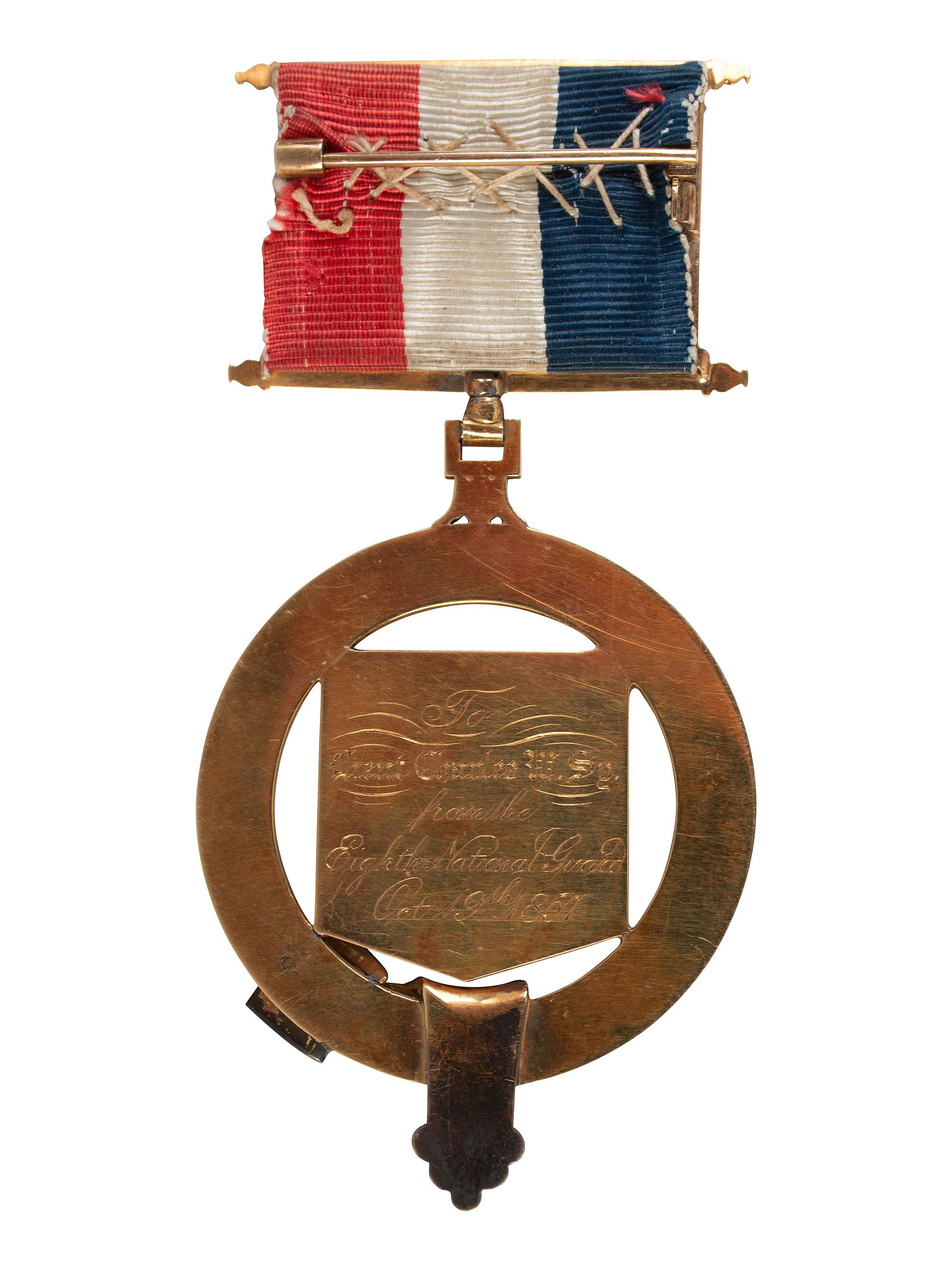 [CIVIL WAR]. Pair of medals presented to Lieutenant Charles W. Sy, including NY Faithful Service medal and pre-war gold regimental medal from the 8th NY National Guard.