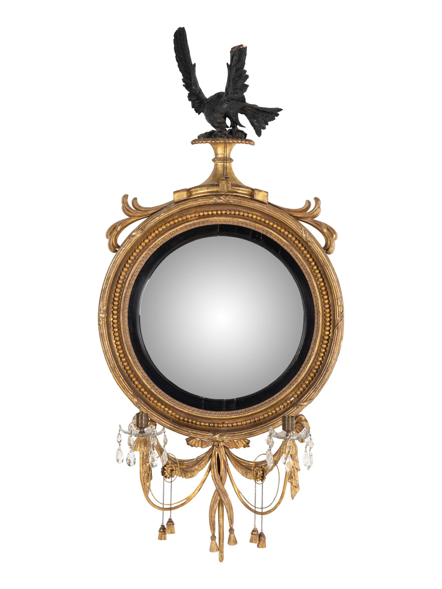 A George III Giltwood and Parcel-Ebonized Girandole Mirror