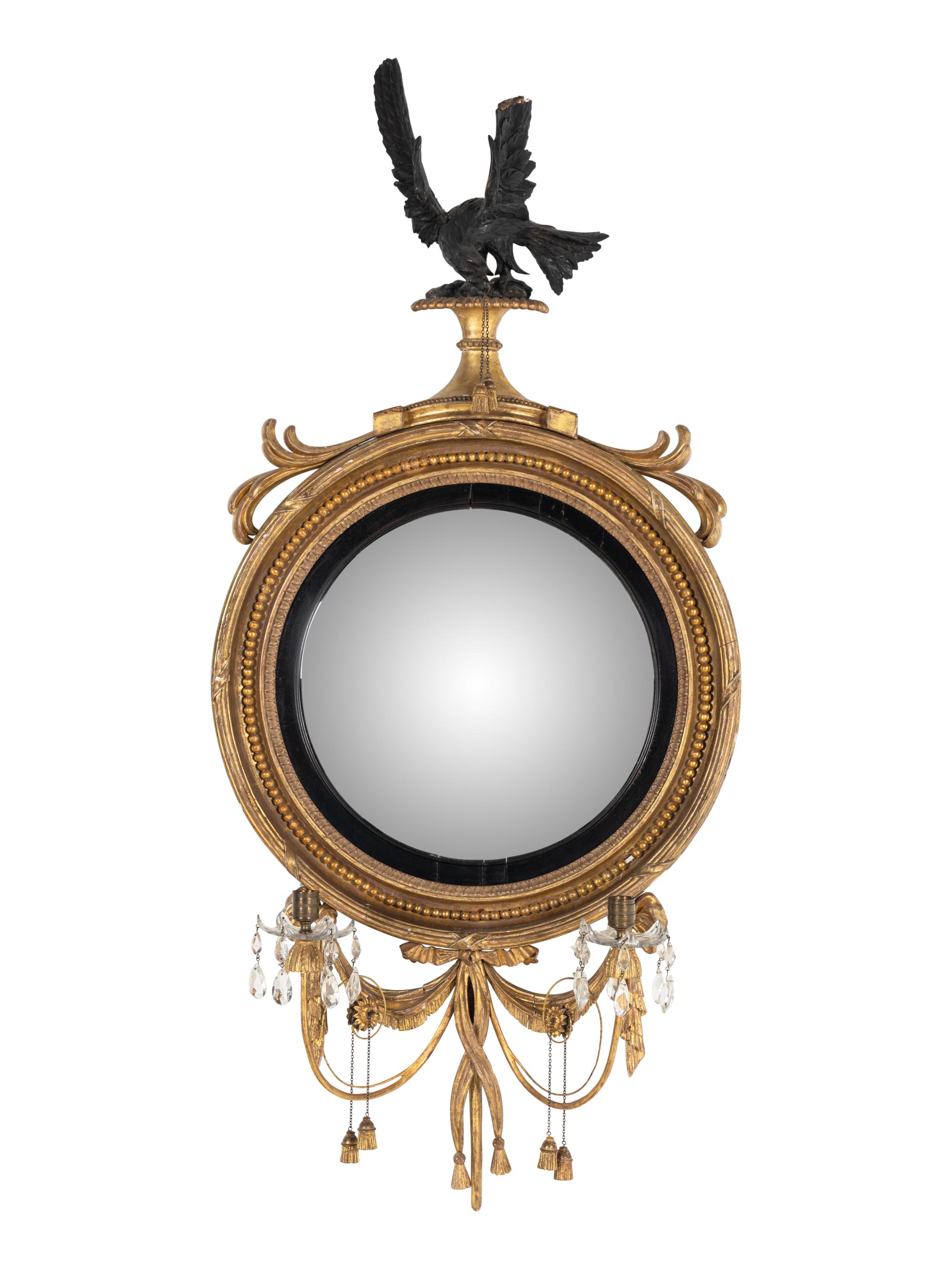 A George III Giltwood and Parcel-Ebonized Girandole Mirror