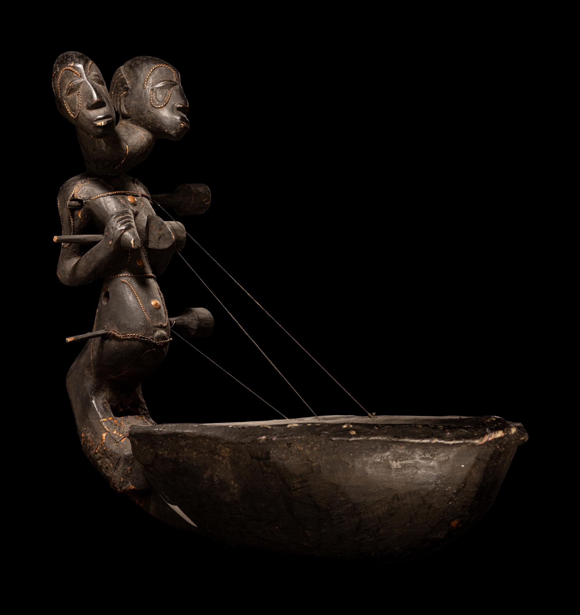An African Harp with Figural Neck