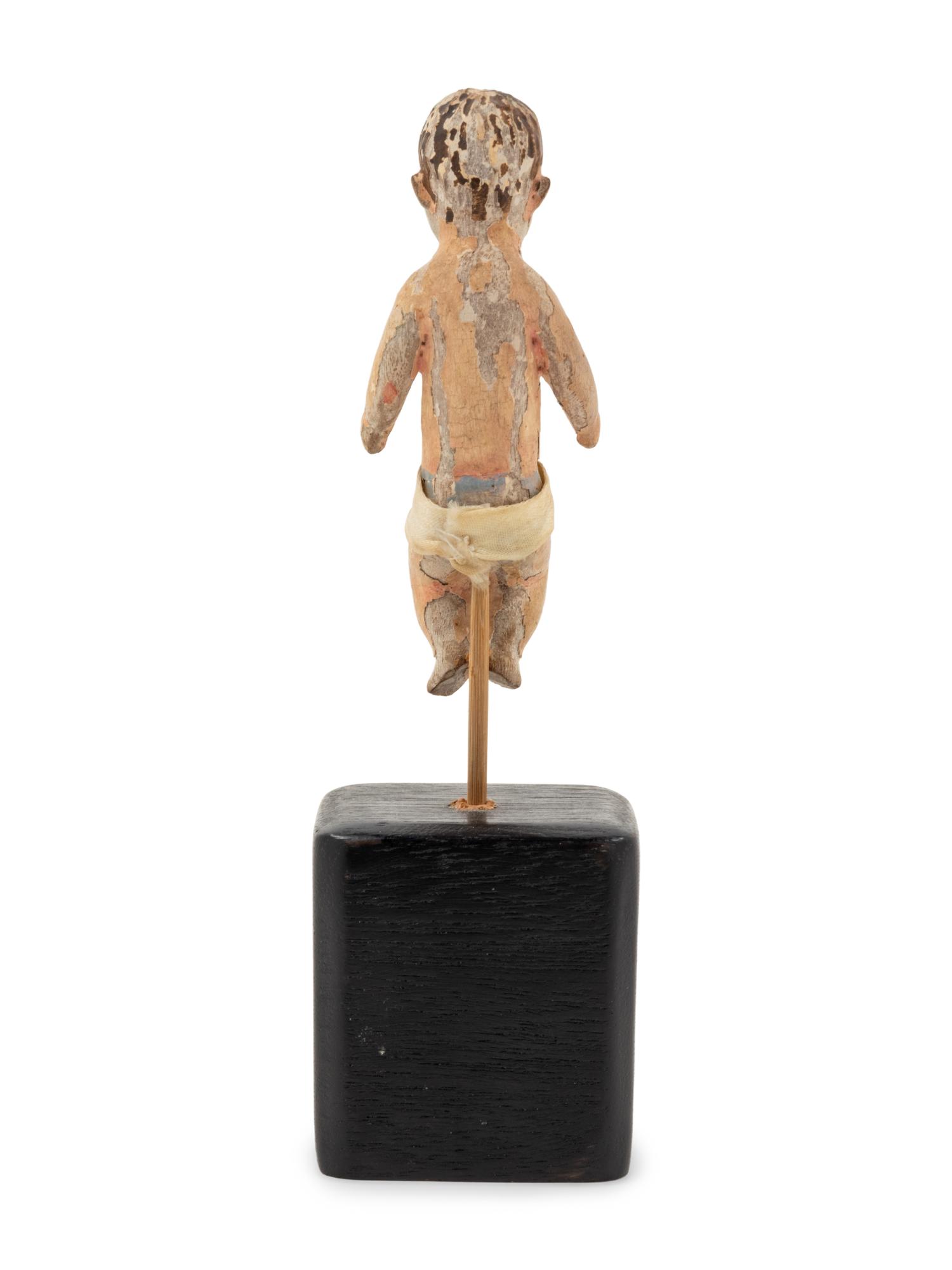 A Spanish Colonial Carved Wood Figure of the Christ Child