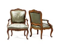 A Pair of Italian Rococo Carved Walnut Armchairs