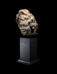 A Roman Marble Head of a Satyr