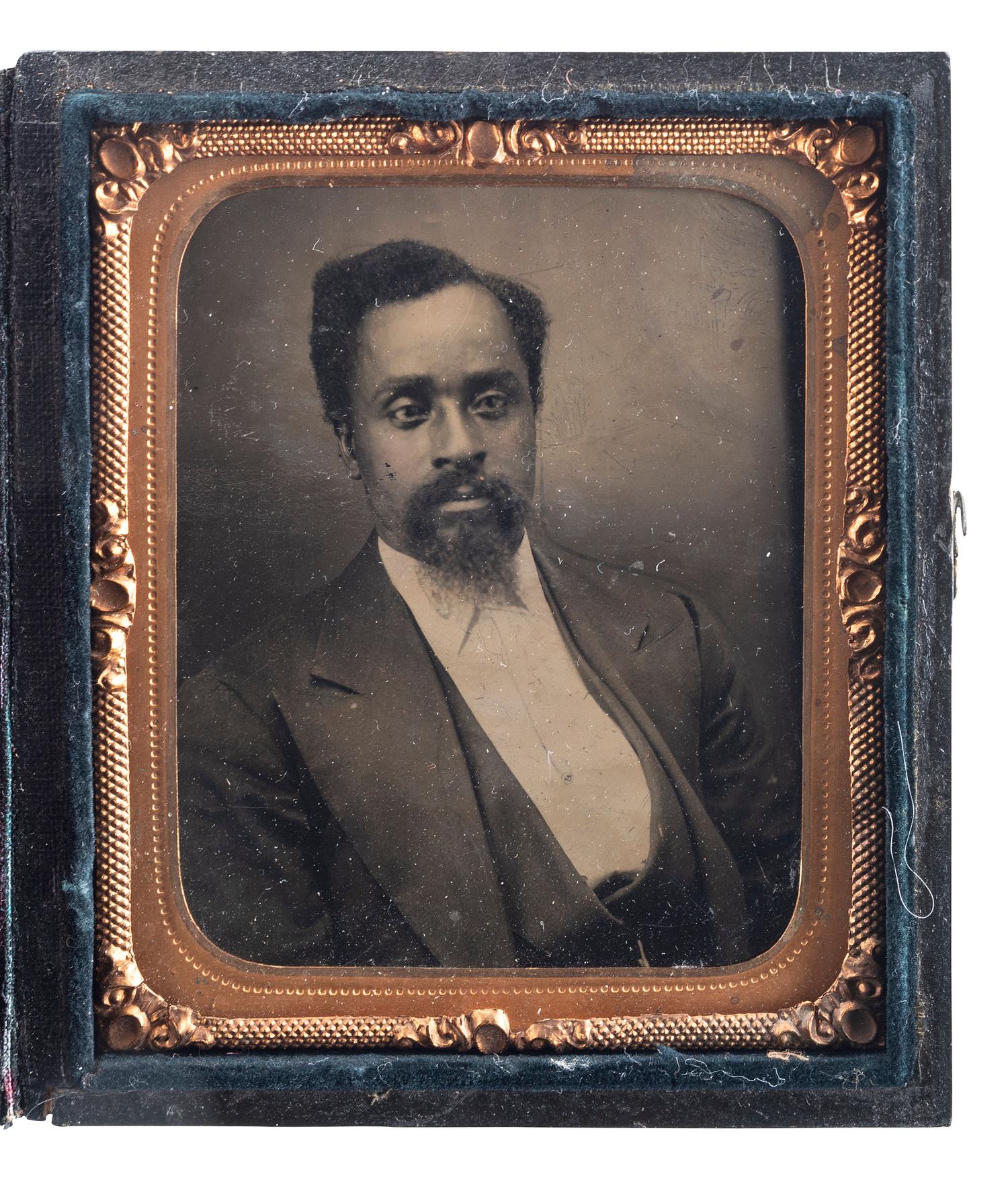 [EARLY PHOTOGRAPHY]. A group of 2 sixth plate tintypes of handsome African American gentlemen, comprising: