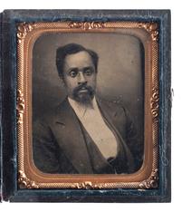 [EARLY PHOTOGRAPHY]. A group of 2 sixth plate tintypes of handsome African American gentlemen, comprising: