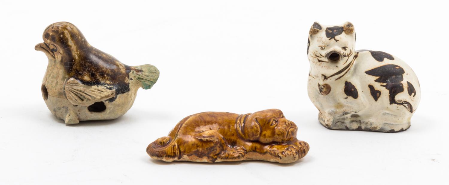Three Pottery Figures of Animals Height of tallest 3 inches.