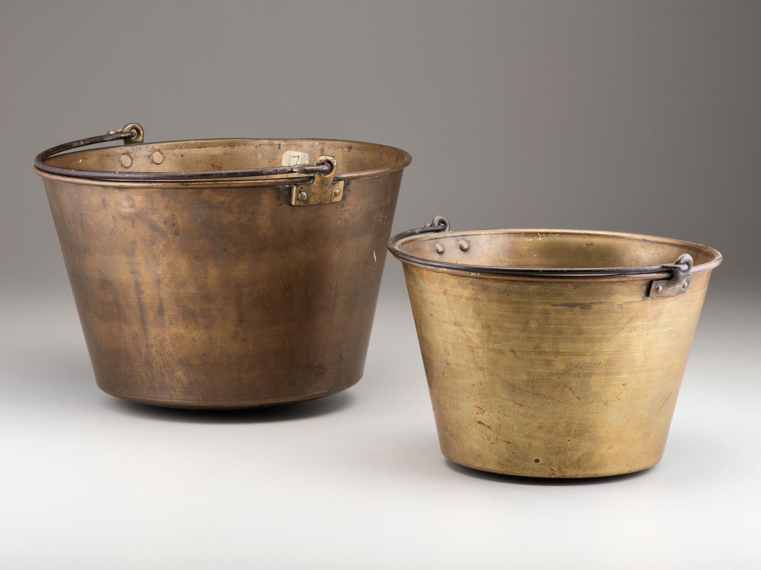 A Copper and Wrought Iron Bowl and Two Spun Brass Buckets
