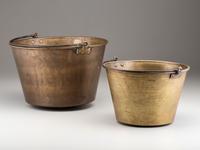 A Copper and Wrought Iron Bowl and Two Spun Brass Buckets