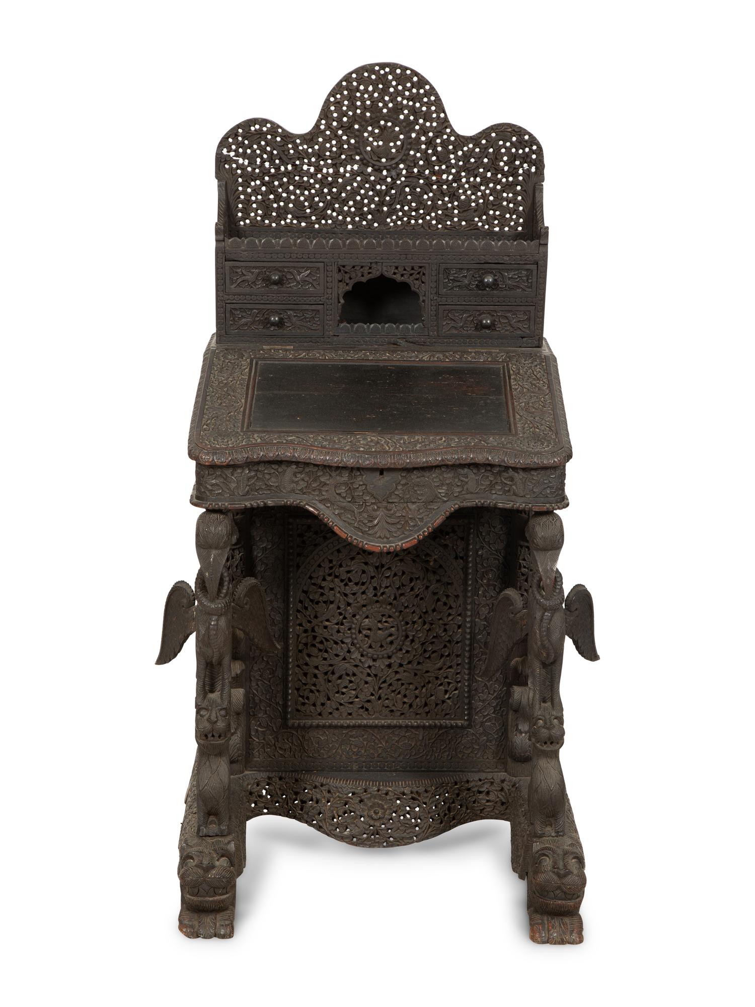 An Anglo-Burmese Carved Teak Davenport Desk