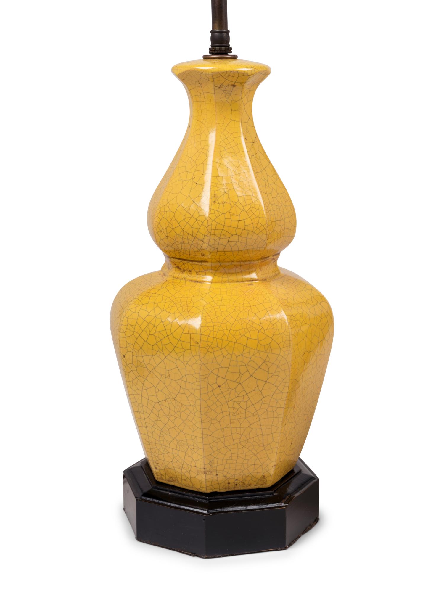 A Pair of Yellow Glazed Pottery Lamps
