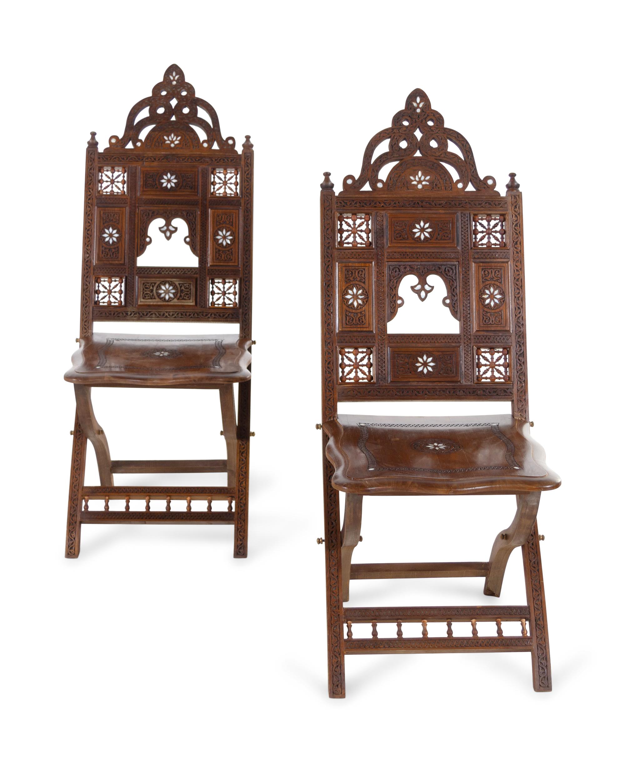A Pair of Moorish Style Mother-of-Pearl Inlaid Walnut Folding Chairs