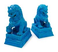 A Pair of Chinese Turquoise Glazed Porcelain Figures of Fu Lions