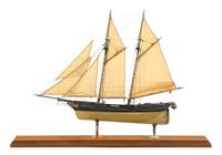 A Model of the Schooner "Dolphin" Height 17 7/8 x length of base 26 inches.