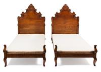 A Pair of Venetian Style Walnut Twin Beds Height 58 x width 39 x depth 73 inches.