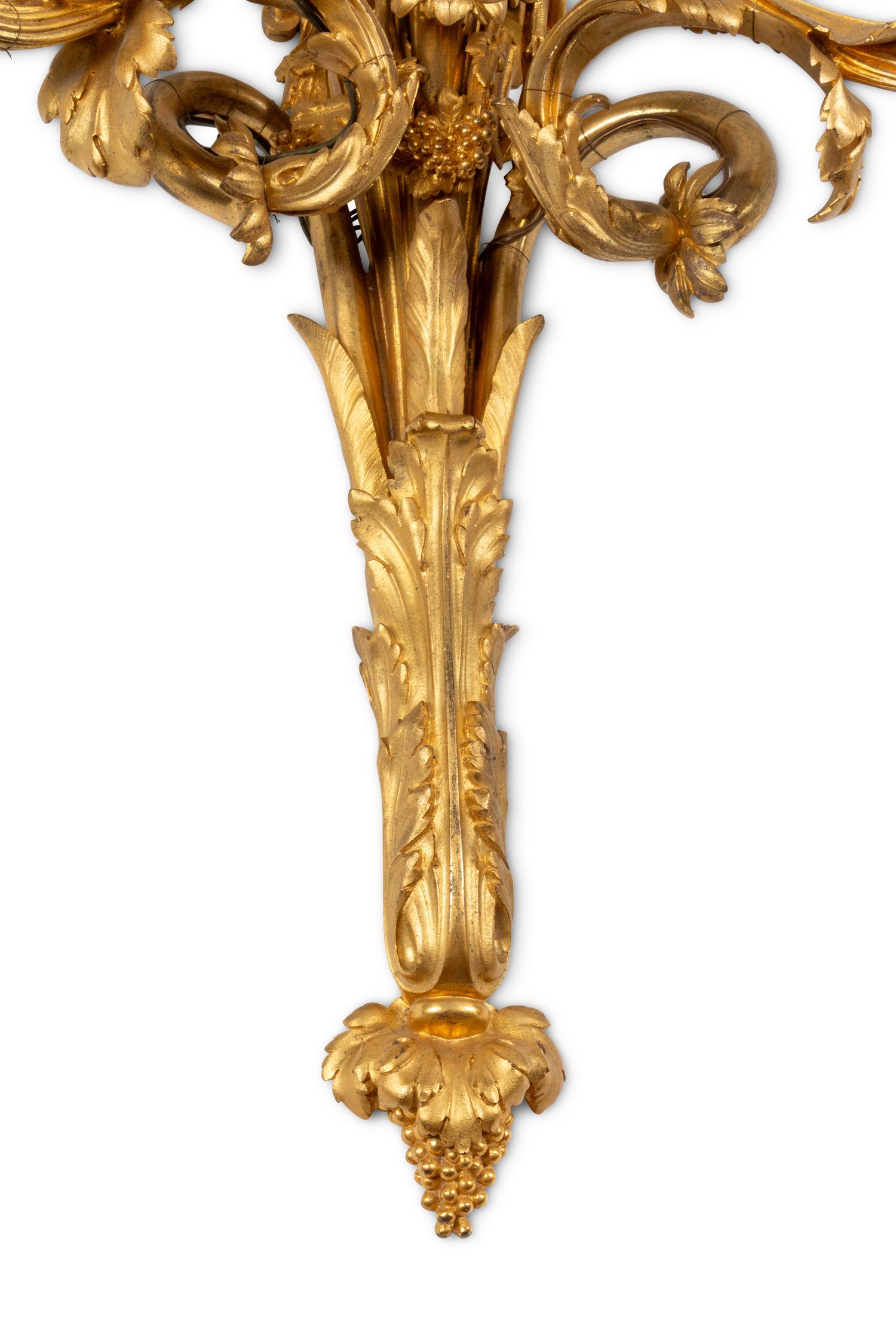 A Pair of Louis XVI Style Gilt Bronze Three-Light Sconces