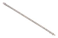 An Art Deco Platinum and Diamond Line Bracelet, E.M. Gattle & Co., 10.20 dwts.