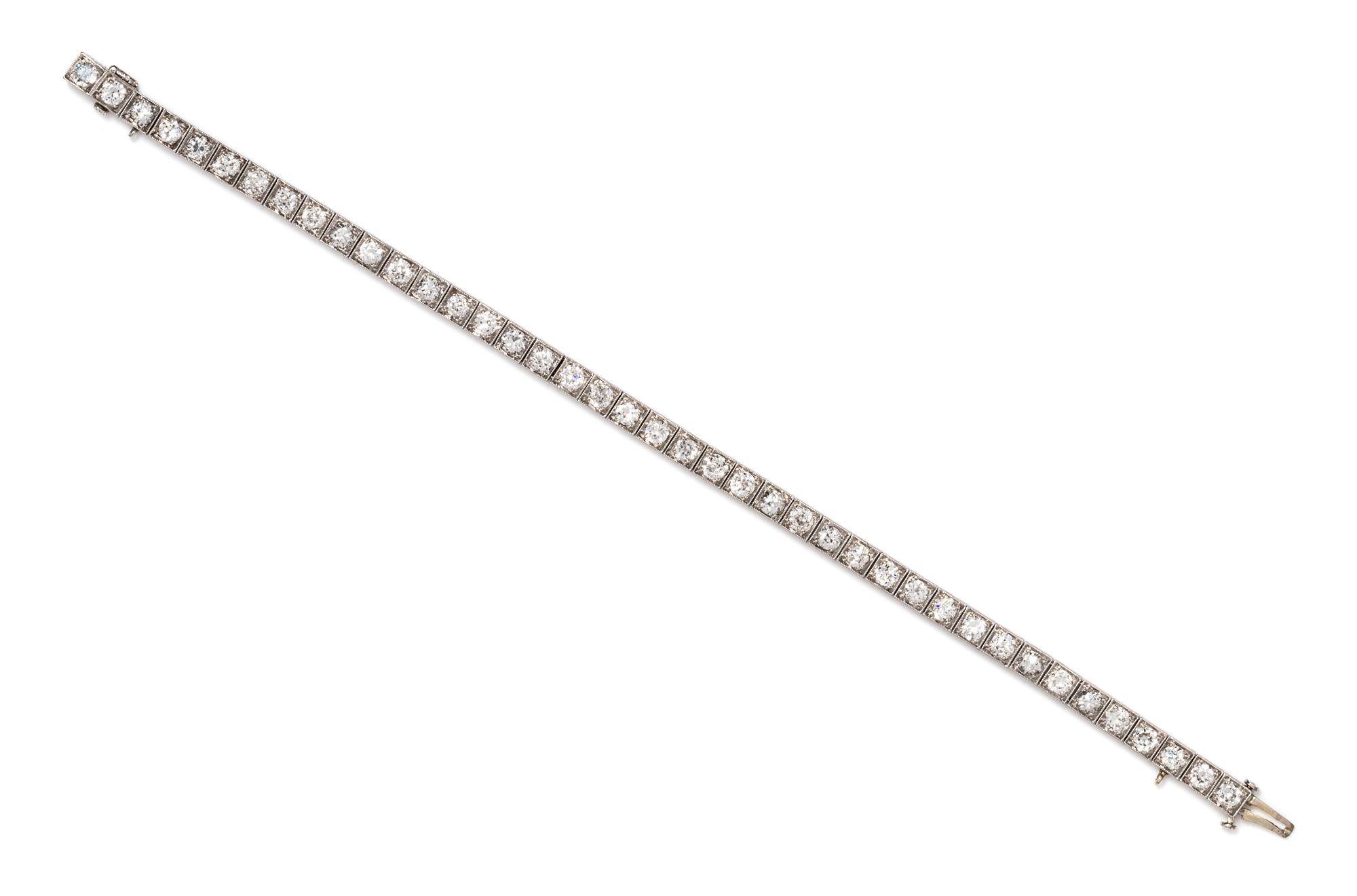 An Art Deco Platinum and Diamond Line Bracelet, E.M. Gattle & Co., 10.20 dwts.