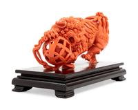 A Carved Coral Figure of a Lion