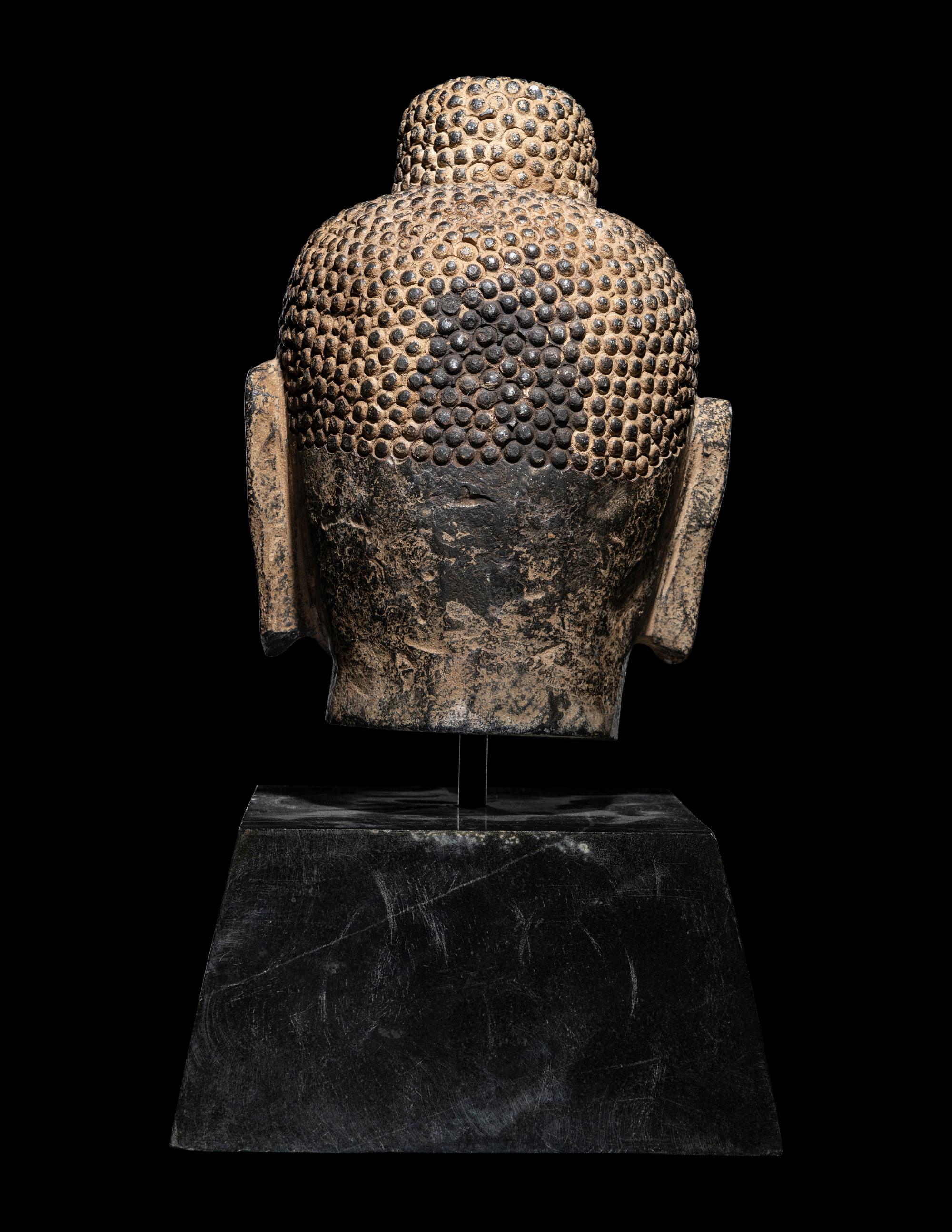A Chinese Carved Stone Head of Buddha