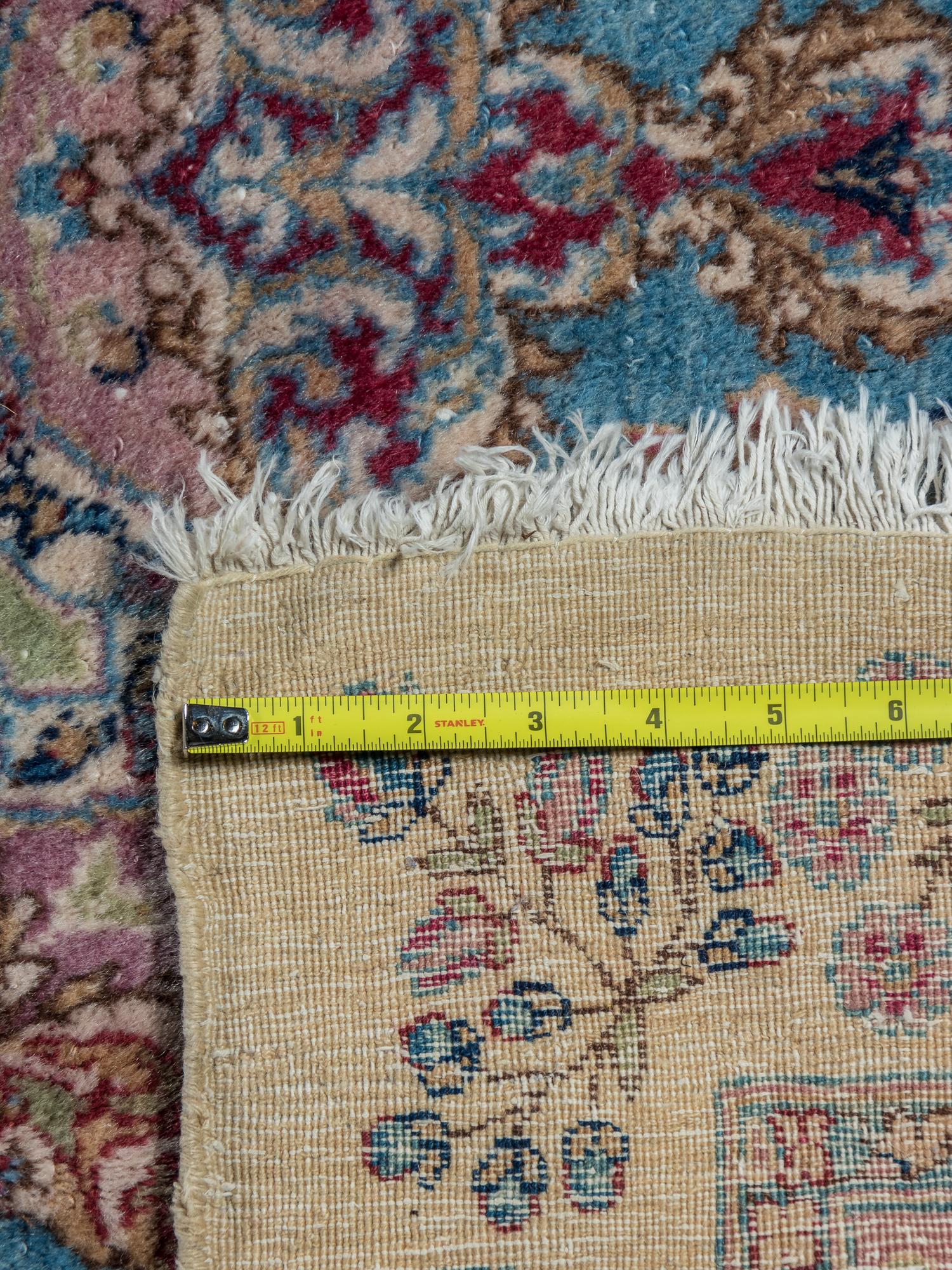 A Kirman Wool Rug