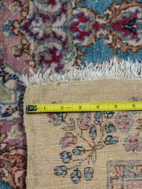 A Kirman Wool Rug