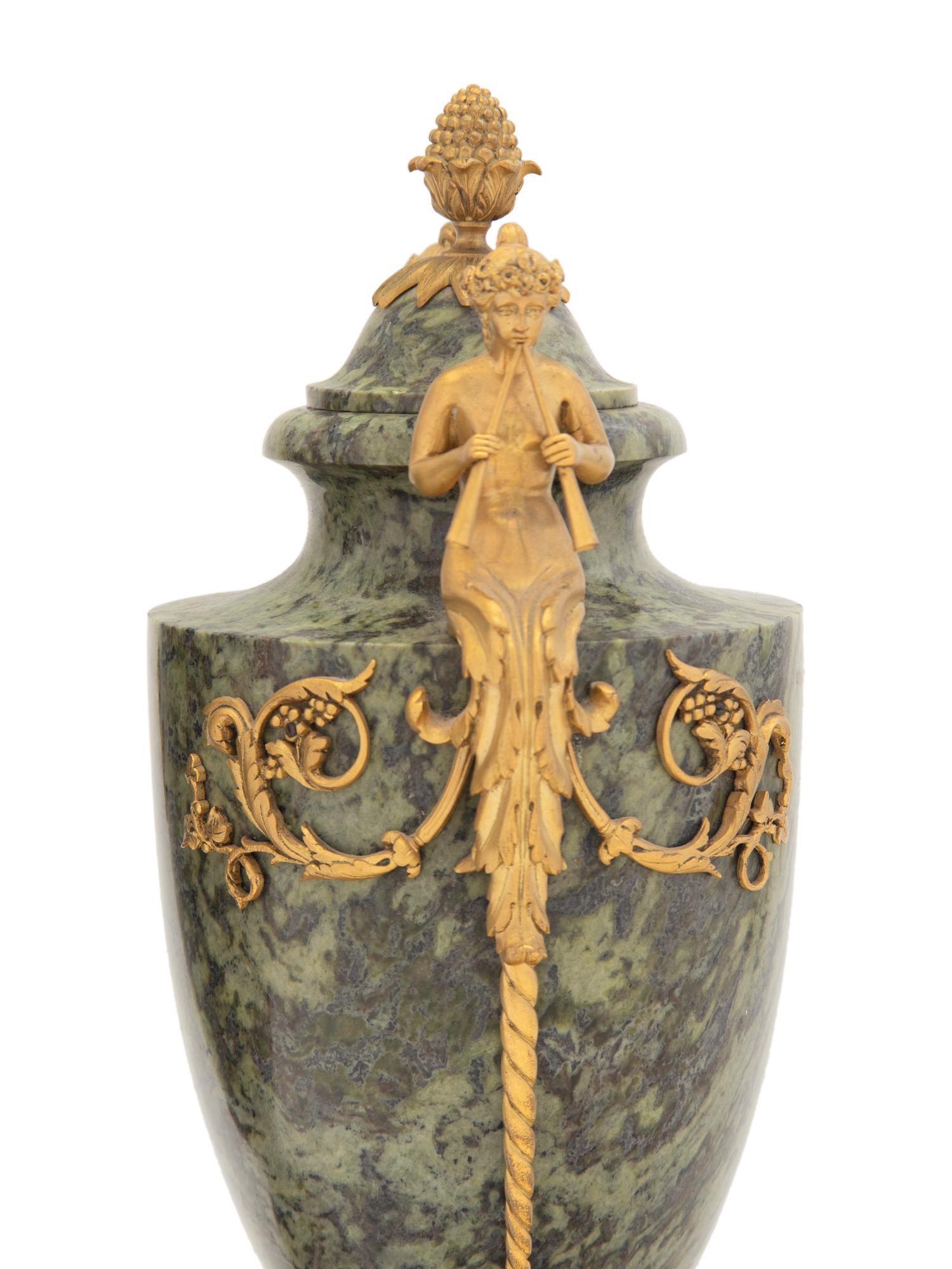 A Pair of French Gilt Bronze Mounted Marble Urns