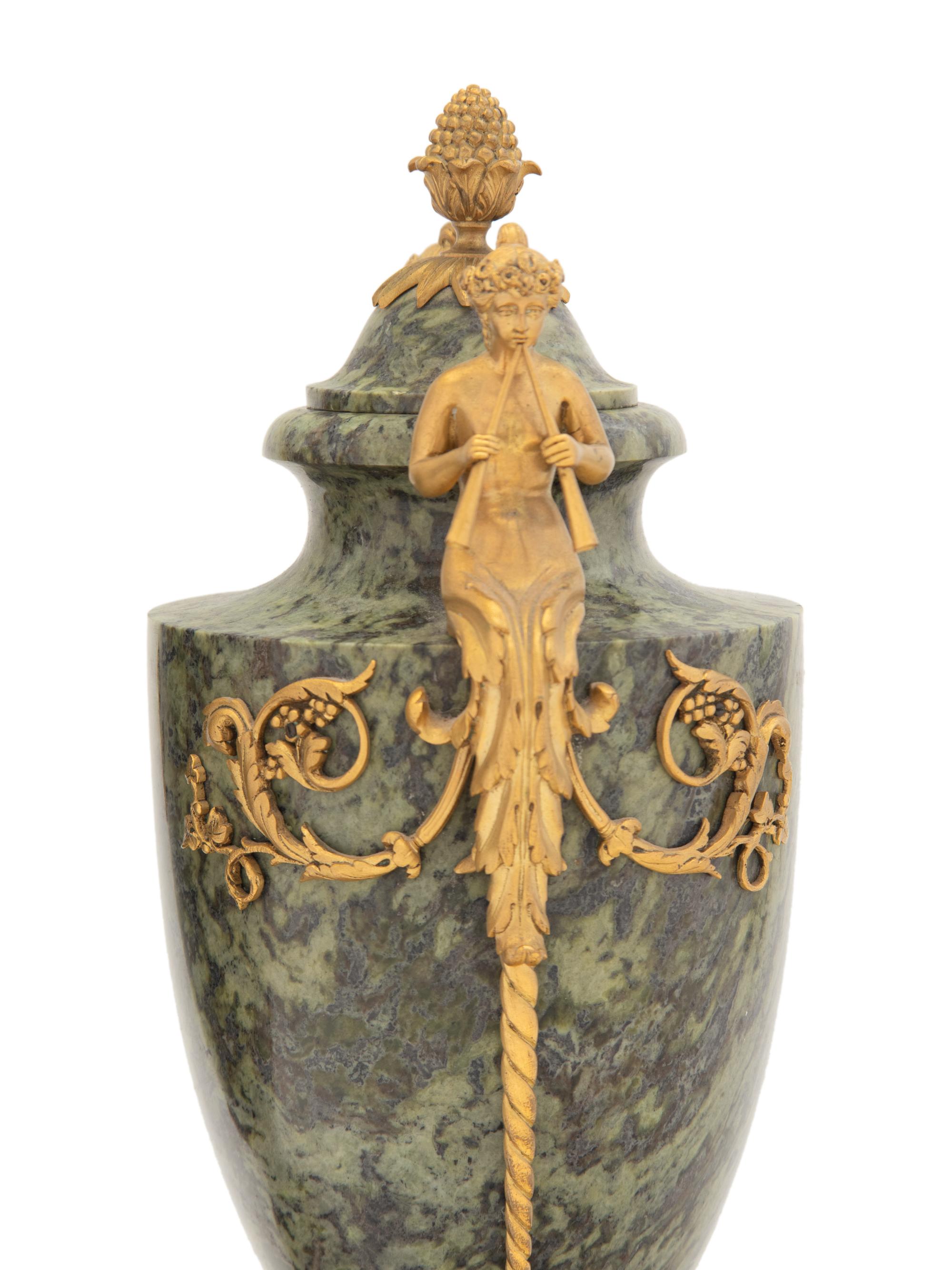 A Pair of French Gilt Bronze Mounted Marble Urns